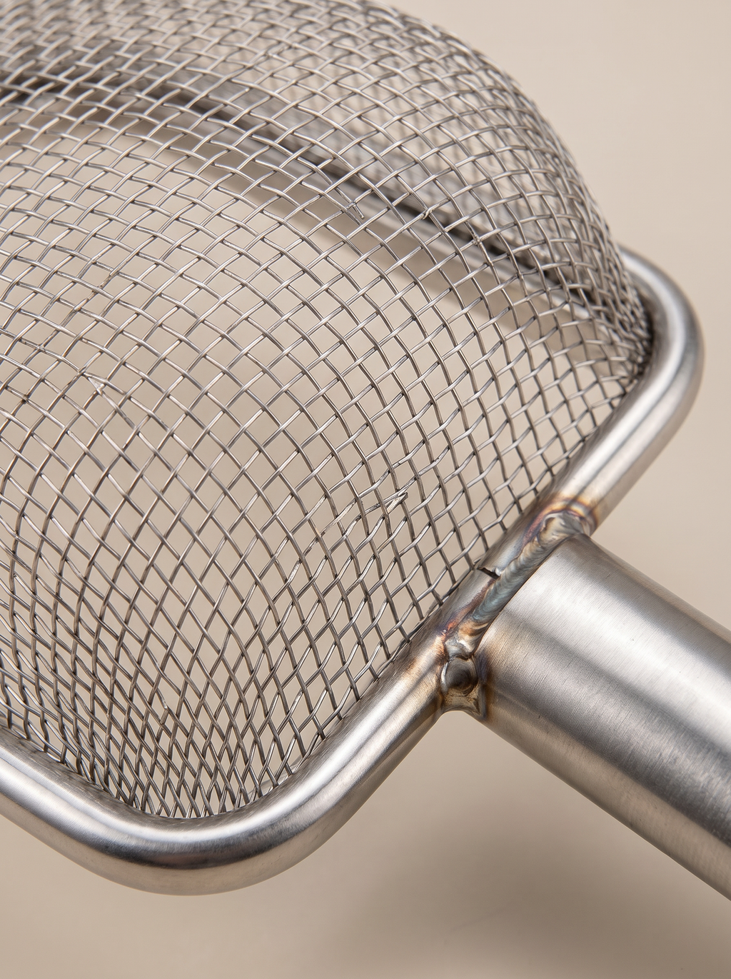 SteelSift Stainless Steel Cat Litter Scoop shown close up, highlighting the fine mesh sifting head