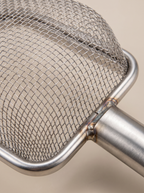 SteelSift Stainless Steel Cat Litter Scoop shown close up, highlighting the fine mesh sifting head